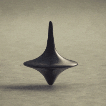 Spinning top - an example of rotation, a movement of the earth